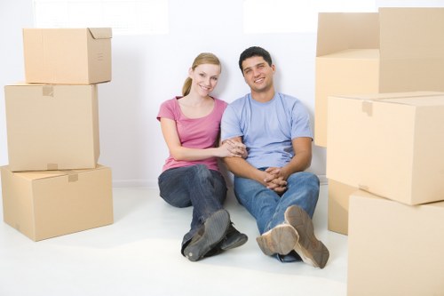 Local man with a van loading furniture for a Swiss Cottage move