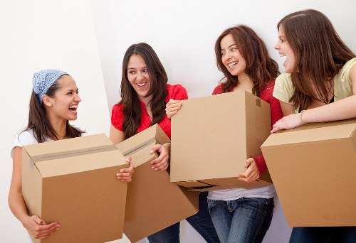 Packed boxes and donated furniture ready for reuse and recycling
