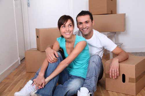Careful loading of office furniture during a Swiss Cottage relocation