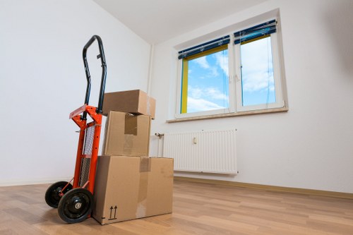 Packed household items ready for a flat removal in Swiss Cottage