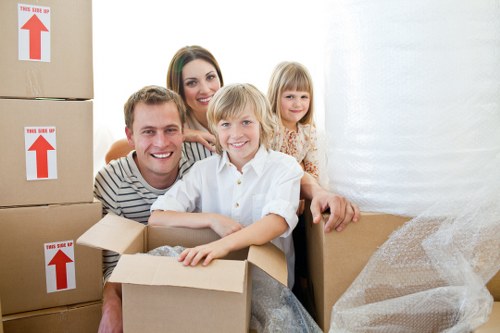 Local movers handling desks and furniture near Swiss Cottage streets